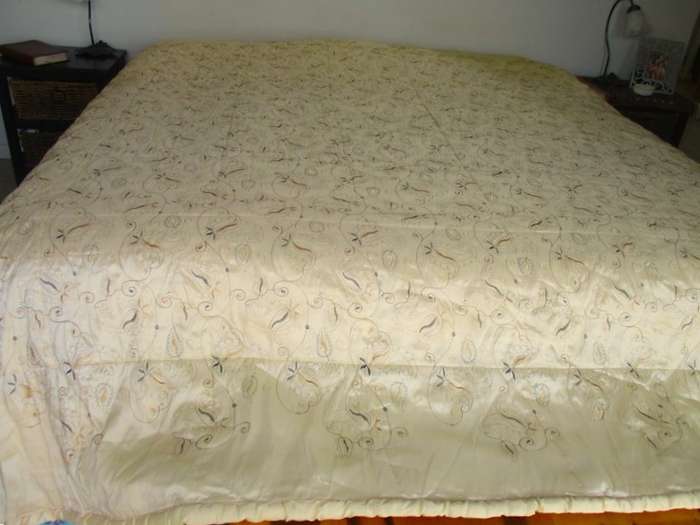 An enormous embroidered light gold comforter to fit king & queen size bed - 269cm x 262cm