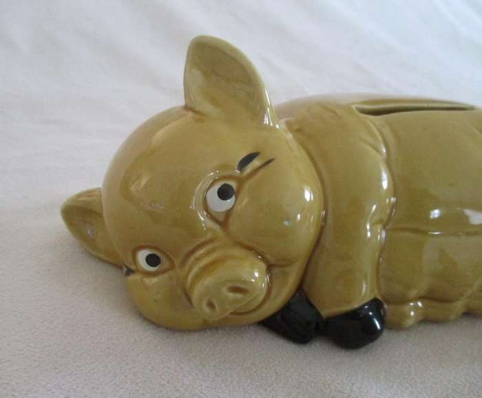 Cute laid back porcelain Piggy bank/savings bank