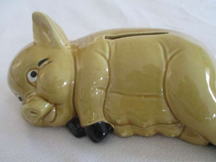 Cute laid back porcelain Piggy bank/savings bank