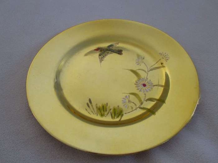 Four beautiful hand painted porcelain gold cake/side plates (disregard reflections)