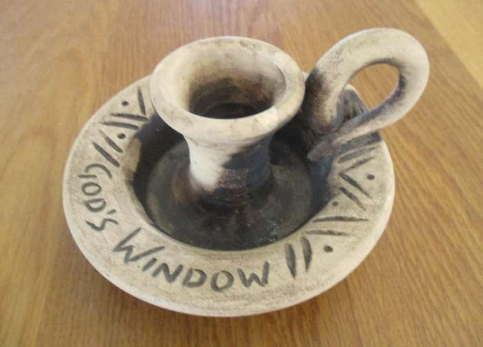 Two quaint handcrafted pottery candlesticks from God's Window - gecko and elephant