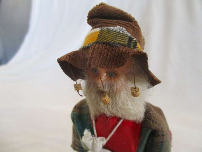 Cute vintage Australian Swagman doll on stand