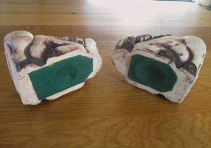 So original! a pair of large ceramic warthog bookends