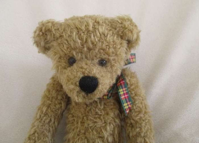 Collectable "Heartfelt Collectibles" Teddy Bear with purposeful "antique bear" look