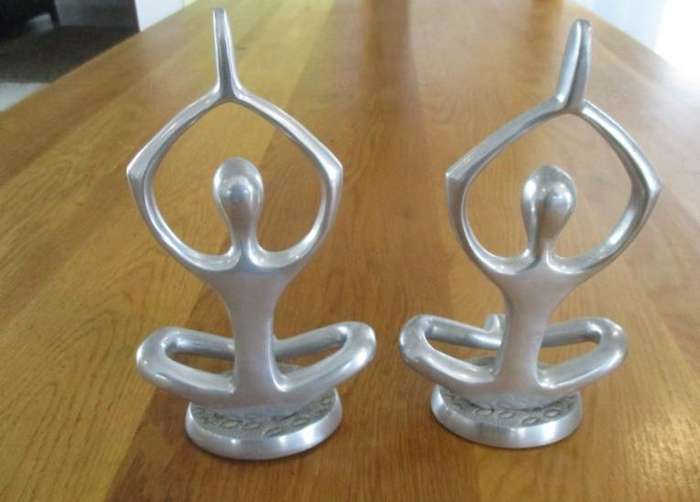 From India - two metal abstract art yoga statues