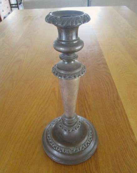 An old vintage, heavy(1.5kgs) candlestick with loads of character