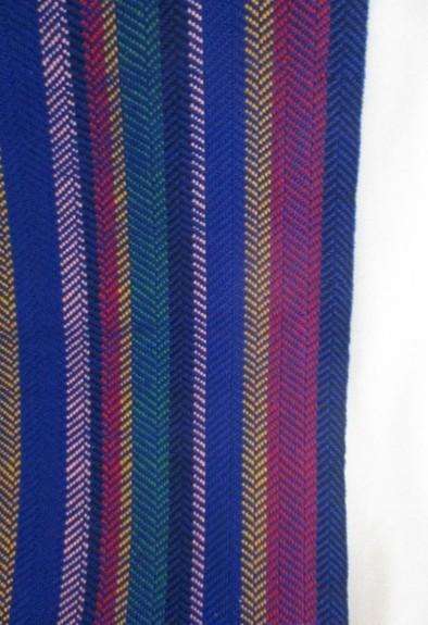 2. A colourful reversable woven throw/shawl - predominantly blue