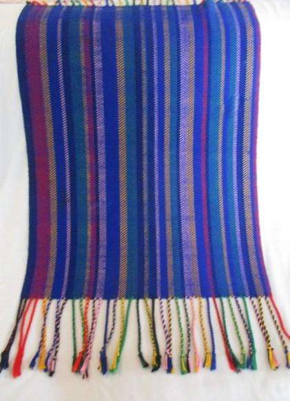 2. A colourful reversable woven throw/shawl - predominantly blue