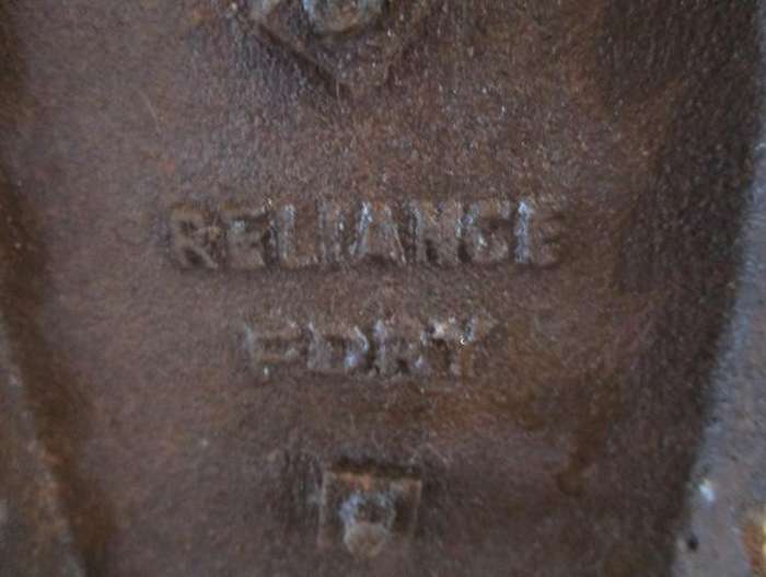 Rare heavy antique 1920's Reliable Foundry, Canada cast iron hot coal iron - great doorstop!