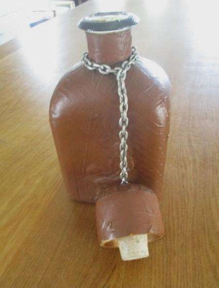 Two beautifully decorative Spanish hand made leather embossed decanters