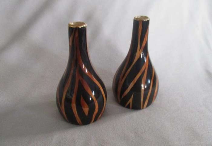 Three striking porcelain vases made in Cape Town