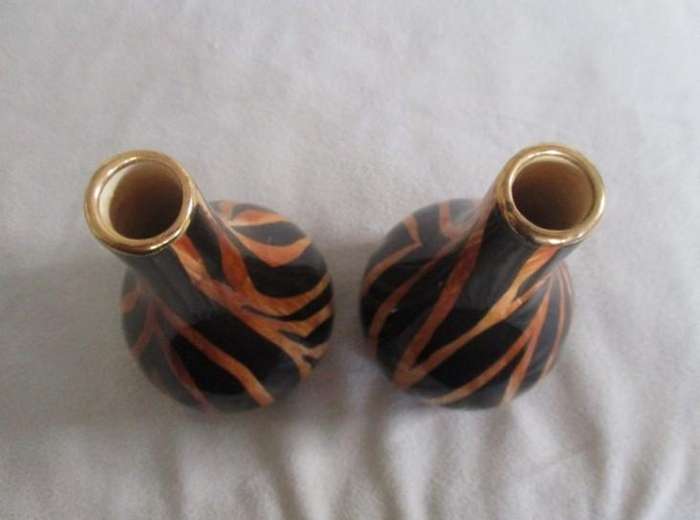 Three striking porcelain vases made in Cape Town