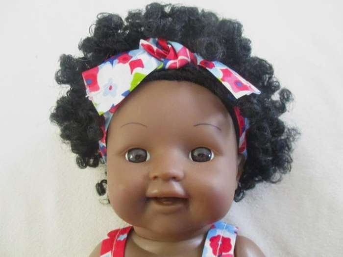 Cute curly topped black doll
