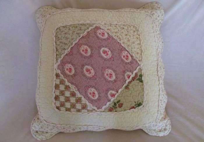 A beautiful quilted cushion in great condition