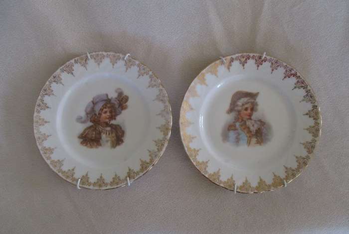 1. Two vintage porcelain display plates of two Victorian young ladies - with hangers