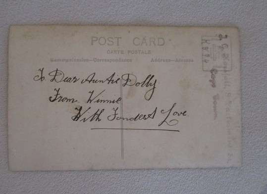 Antique early 1900's postcard - lady sitting in a chair