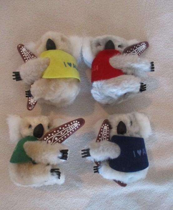 Four very collectable vintage Koala pencil huggers - excellent still with original boomerangs