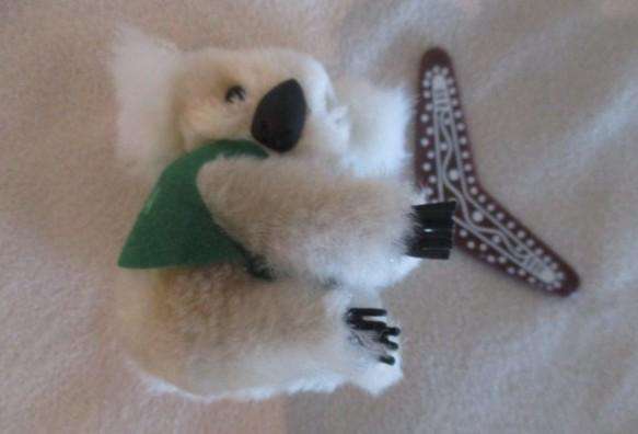 Four very collectable vintage Koala pencil huggers - excellent still with original boomerangs
