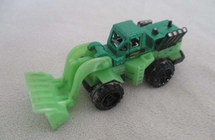 A batch of six small Die Casts - four New-Ray locomotives plus Hot Wheels Ratmobile and Wheel Loader