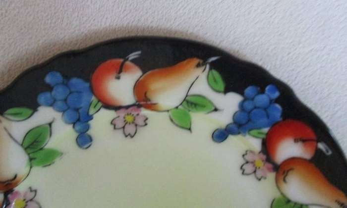 Two striking vintage hand painted plates from Japan