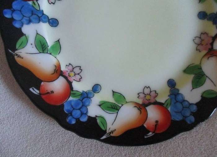 Two striking vintage hand painted plates from Japan