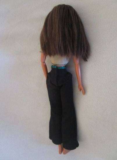 Pretty articulated Mattel Barbie with original top and earrings - Operations Safari Barbie?