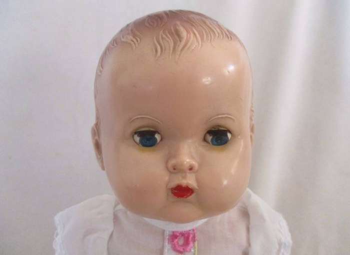 Vintage hard plastic doll made in England