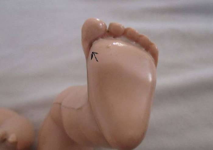 Vintage hard plastic doll made in England