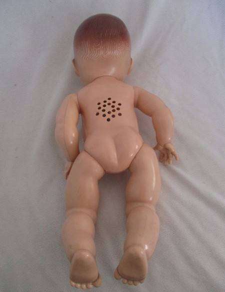 Vintage hard plastic doll made in England