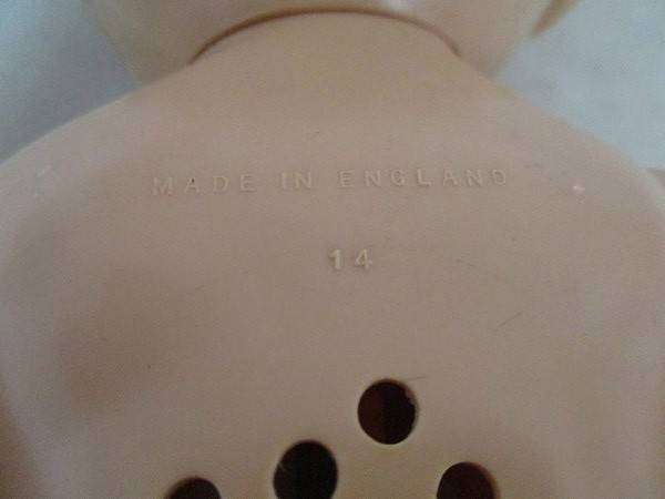 Vintage hard plastic doll made in England