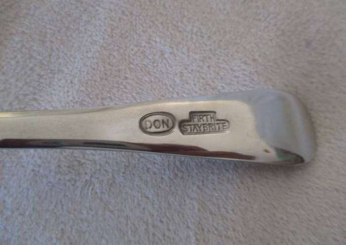 Fourteen vintage Firth Staybrite (DON) forks in canister