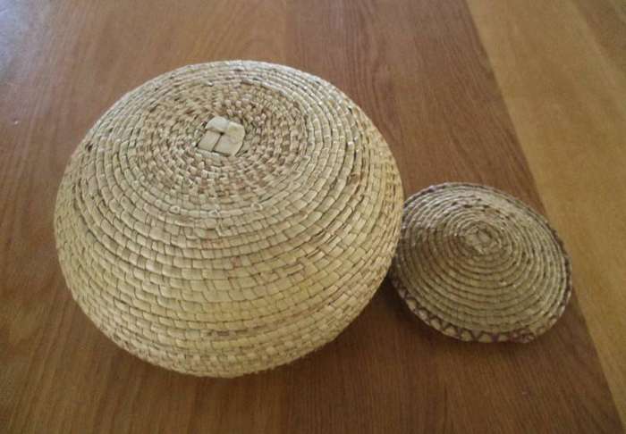 Two vintage, expertly woven lidded snake charmer's baskets in great condition
