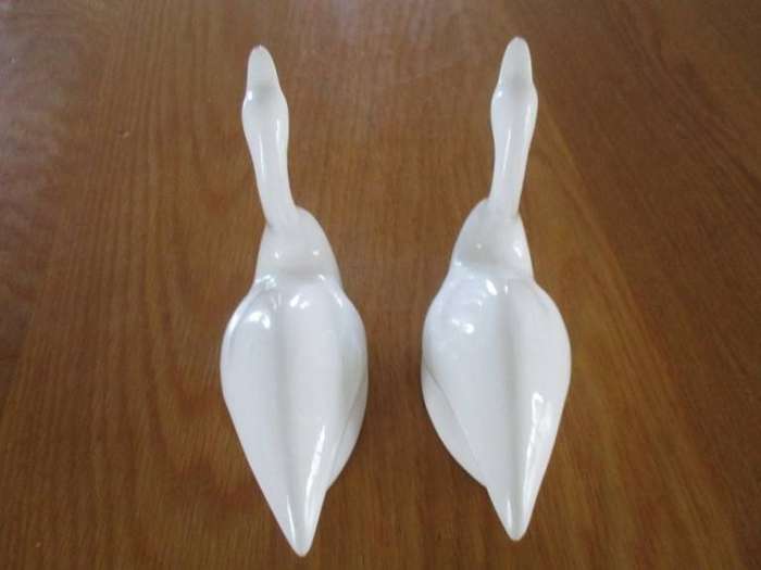 Two elegant white porcelain swans