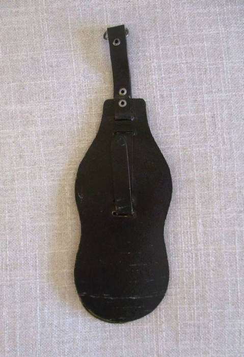 Two rather large horse brasses on leather strap