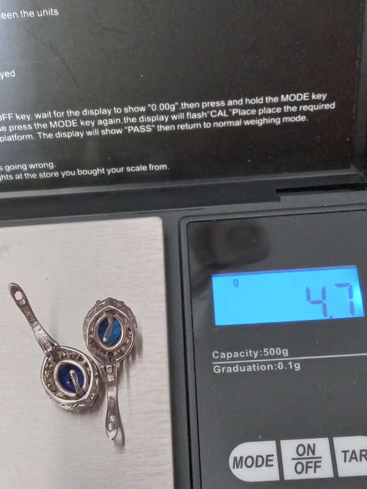 A Pair Of Sterling Silver Blue And White Cz Earrings