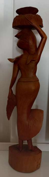 Wooden carved statue of woman