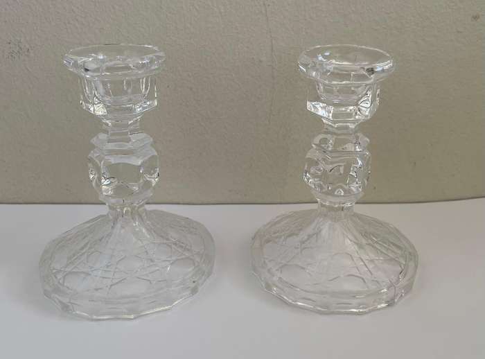 TWO SMALL CUT-GLASS CANDLE STICKS