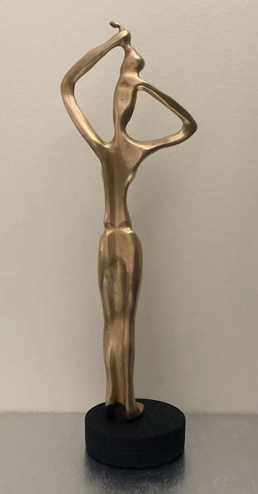 BRONZE STATUE - WATER CARRIER ON BLACK WOODEN BASE