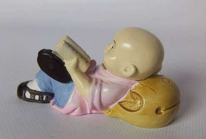 UNDER R100 - Collectable - A vintage solid resin Chinese boy figure