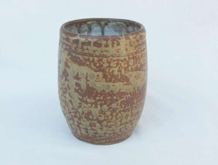 A vintage pottery mug with destinct makers stamps