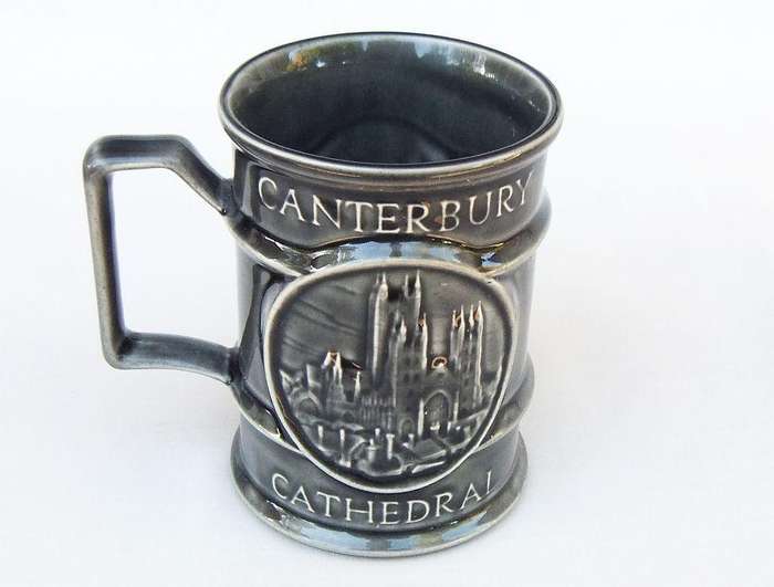 A vintage pottery mug by Holkham depicting the Canterbury cathedral