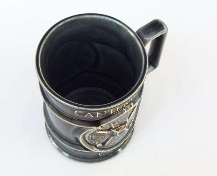 A vintage pottery mug by Holkham depicting the Canterbury cathedral