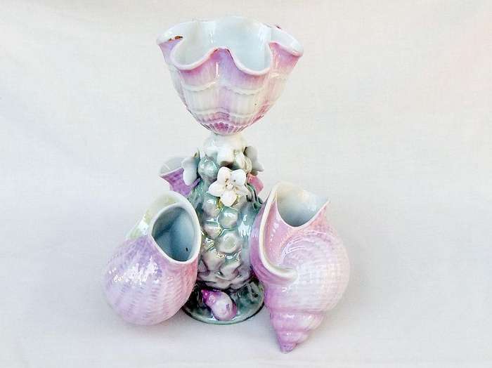A rare numbered early 1900`s antique German porcelain centrepiece with shell and floral motif
