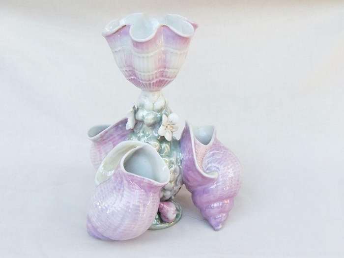 A rare numbered early 1900`s antique German porcelain centrepiece with shell and floral motif