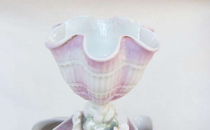 A rare numbered early 1900`s antique German porcelain centrepiece with shell and floral motif