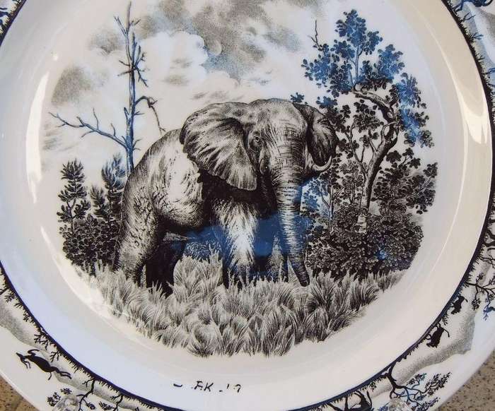 A vintage South African porcelain display plate with elephant motif