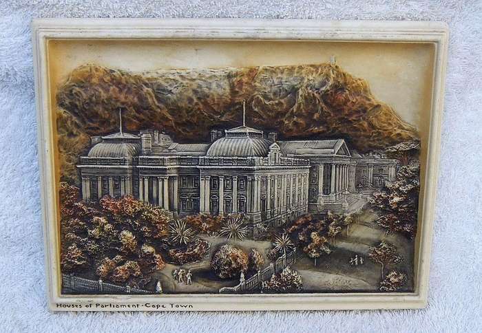 An early 20th century Ivorex plaque depicting the houses of parliament in Cape Town