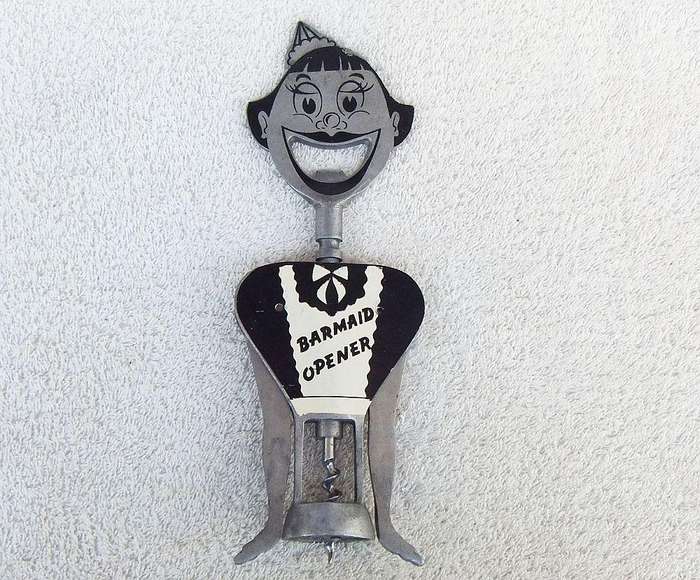 A vintage 1950`s Barmaid corkscrew with bottle opener