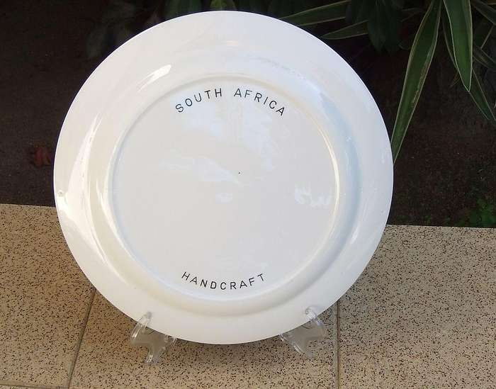 A vintage South African porcelain display plate with elephant motif