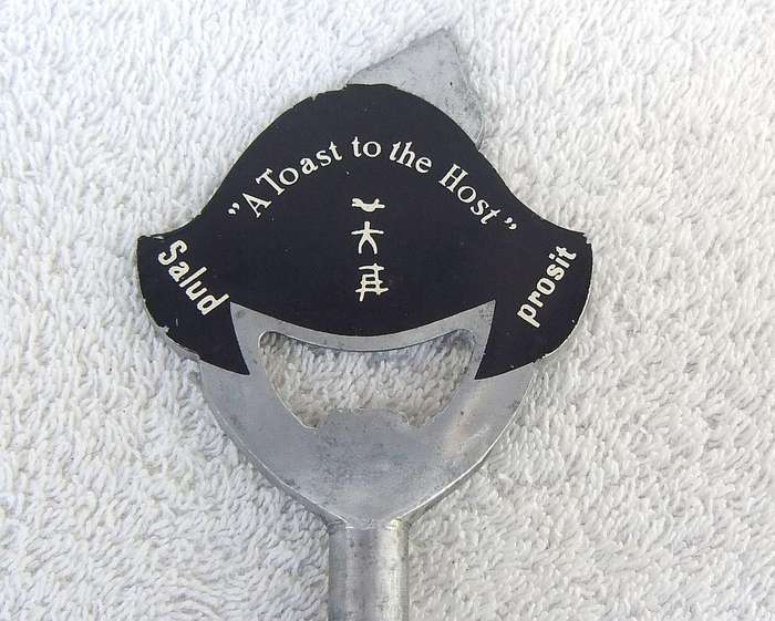 A vintage 1950`s Barmaid corkscrew with bottle opener